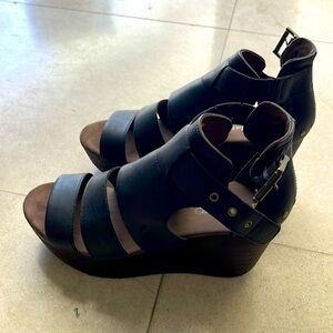 Caterpillar Black wedge gladiator heels